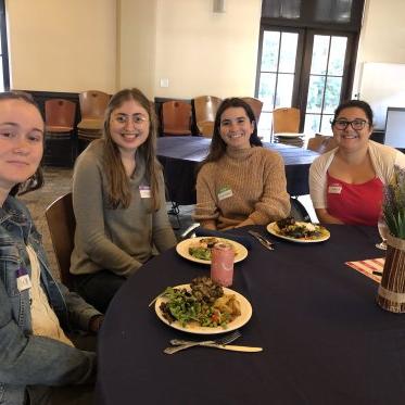 four students having a meal 